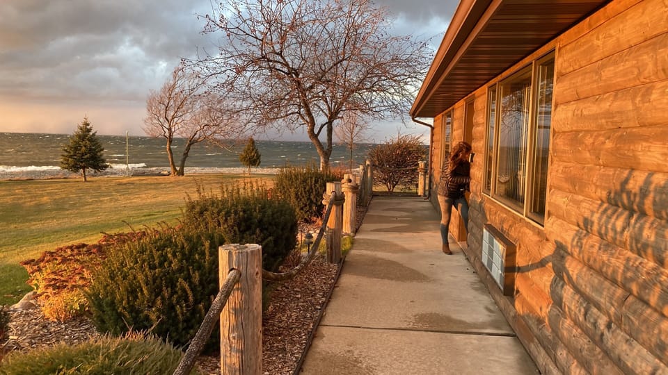 Sunset views from the front porch and out the large bay windows.

