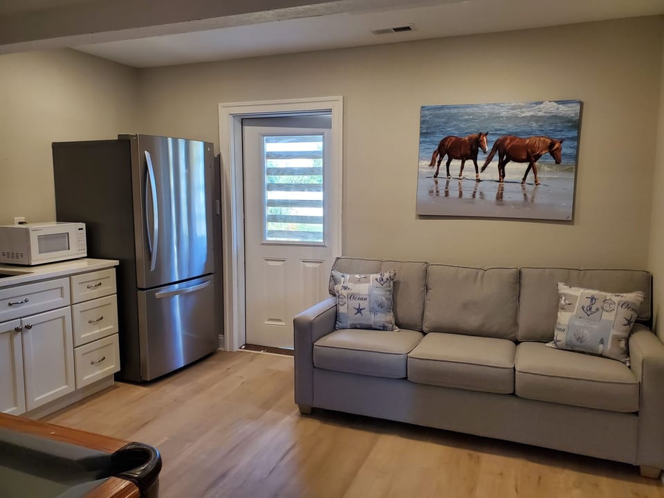 Recreation/Game Room - Upon entry you'll enter a recreation room with an extra refrigerator and microwave for added privacy.