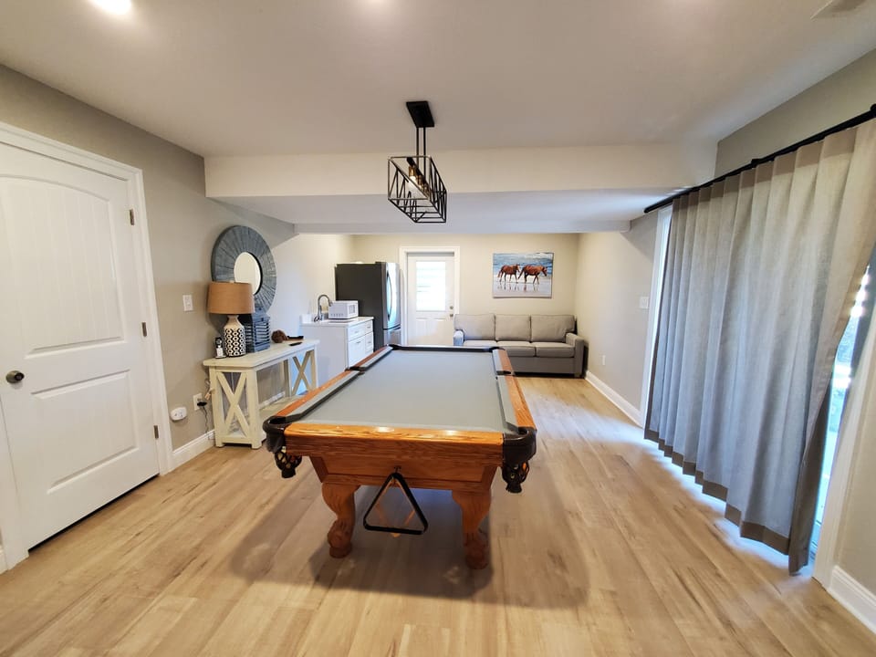 Pool Table in Recreation Room - Upon entry you'll enter a recreation room with pool table and modern coastal designs.