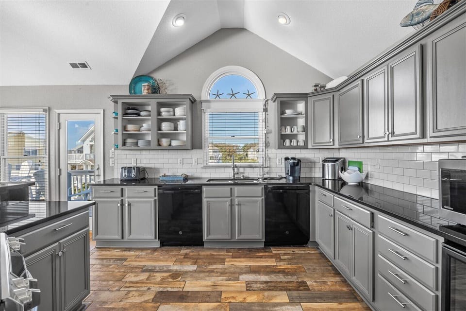 Kitchen - Modern designs and stainless appliances make this kitchen an entertainer's dream.