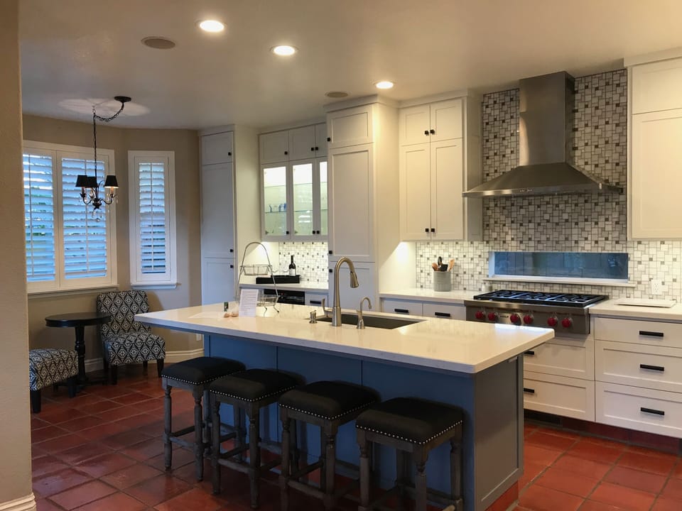 Kitchen Island with bar seating, coffee nook, and wine service bar