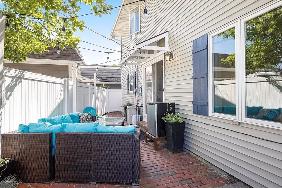 Lovely patio with plenty of seating as an extra hang area
