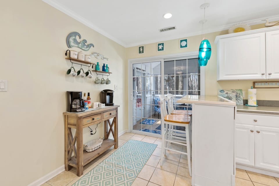 Enjoy a coffee out on the deck or in the screen room. We provide K Cups & sugar