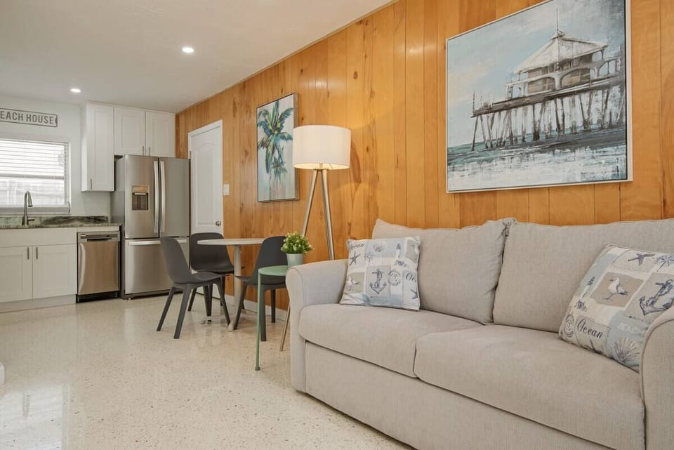 Cozy living room with a sofa bed and  a Smart TV.