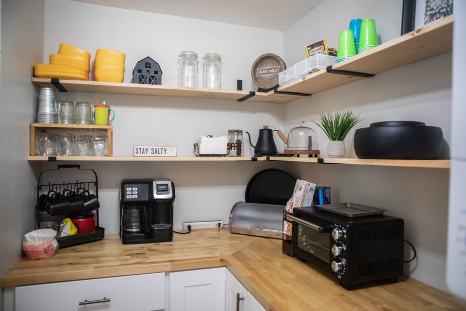 butlers pantry equipped with kitchen necessities, outdoor plates & more