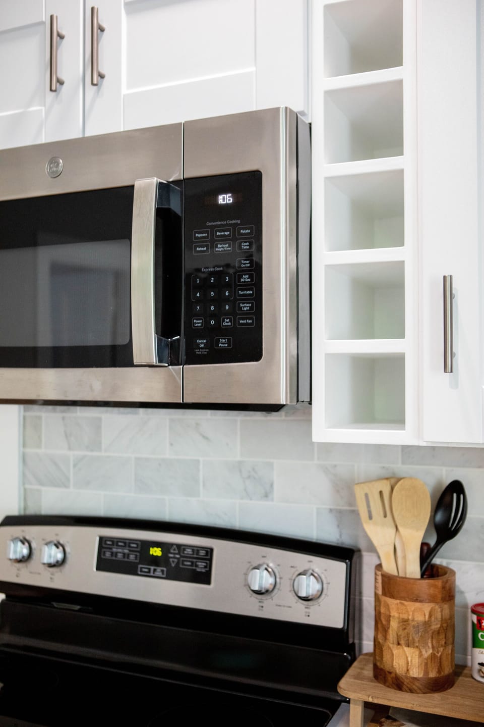 Kitchen equipped with stainless steal appliances