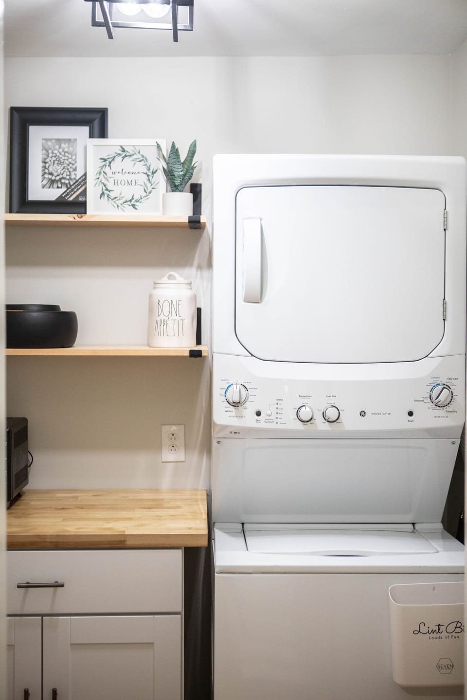 in-home laundry and dryer located in the butlers pantry