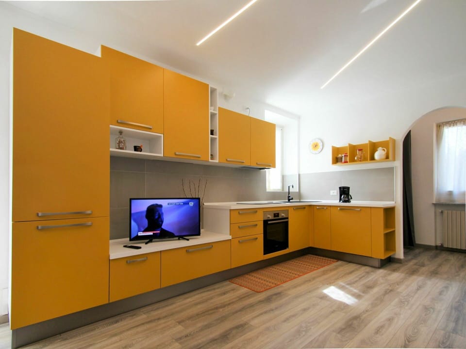 Cabinetry, Furniture, Countertop, Building, Orange, Hall, Interior Design, Flooring, Floor, Kitchen