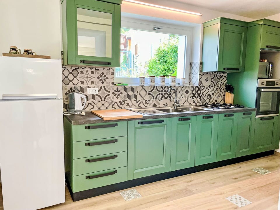 Cabinetry, Kitchen Sink, Countertop, Sink, Kitchen, Kitchen Appliance, Kitchen Stove, Tap, Interior Design, Home Appliance