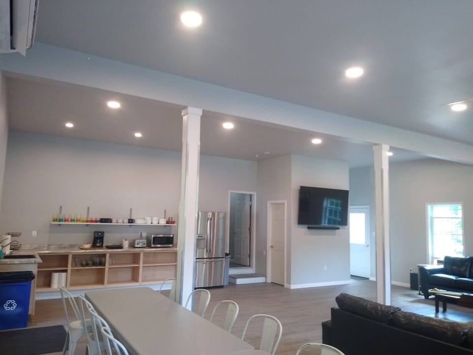 Secondary kitchen w/ sink, 36" refrigerator, 2nd dishwasher w/ 20ft. countertop.