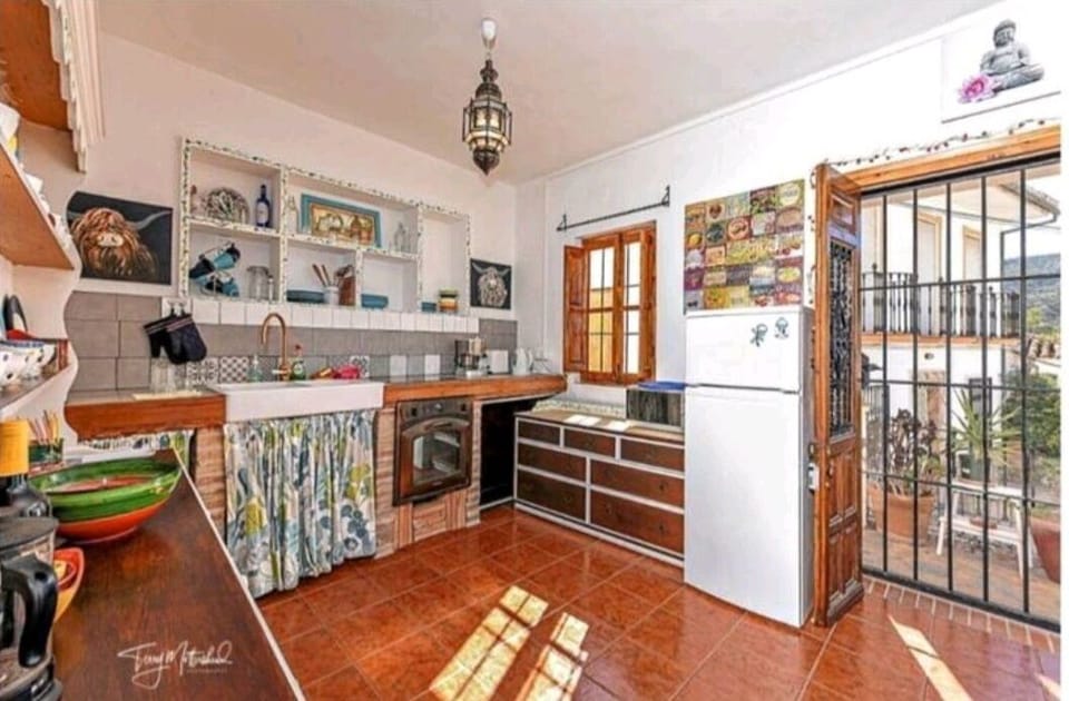 Light & airy with 2 large windows & double doors flooding the space with light