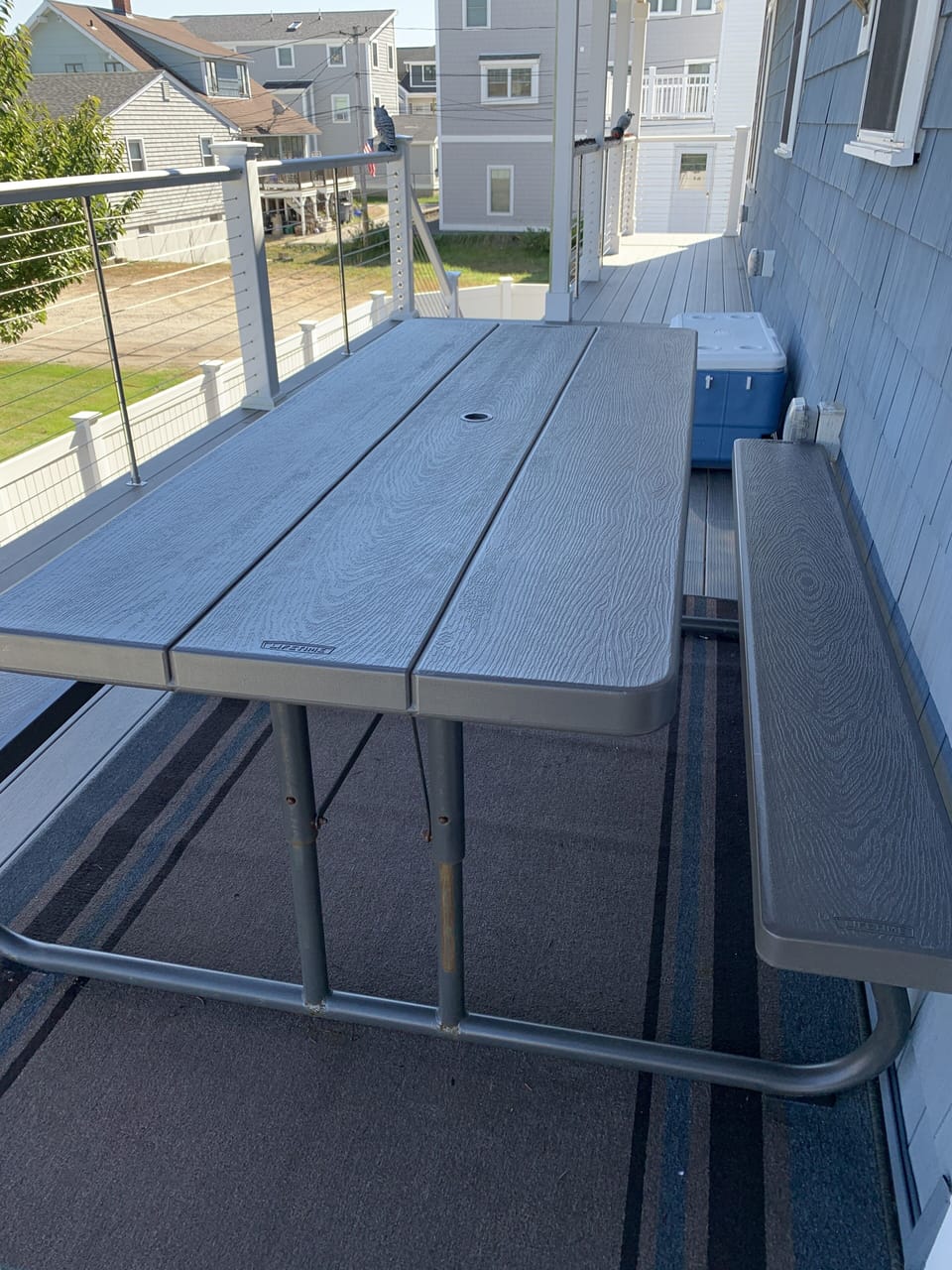 Main level deck overlooking private patio.