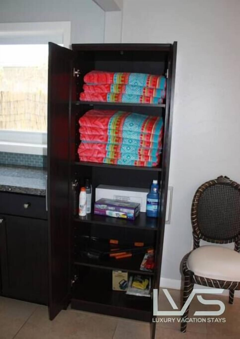 Pool/Beach Cabinet with Beach/Pool Towels, sunblock, electric float pump, and more!