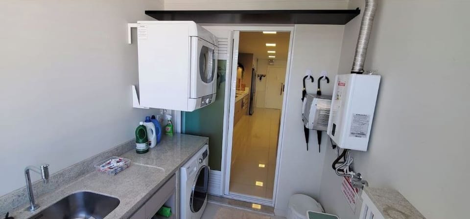 Laundry area with washer/dryer and filtered drinking water