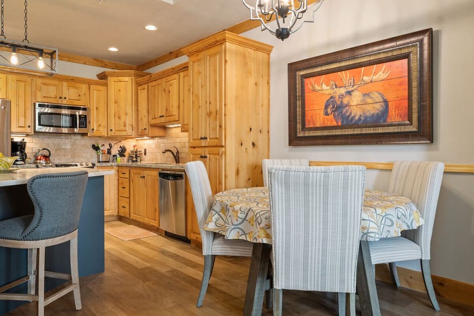 Share memorable meals beneath warm lighting and cabin accents.