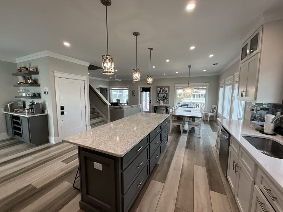 Chef’s Delight! - Quartz counter tops and stainless steel appliances are standout features of this modern kitchen.