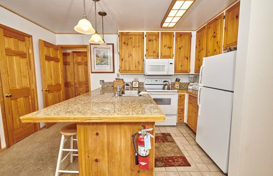 Room, Indoors, Refrigerator, Kitchen Island, Kitchen