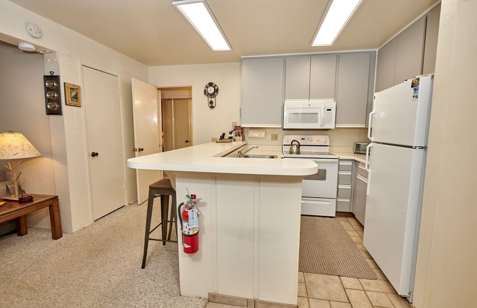 Room, Indoors, Refrigerator, Kitchen, Kitchen Island