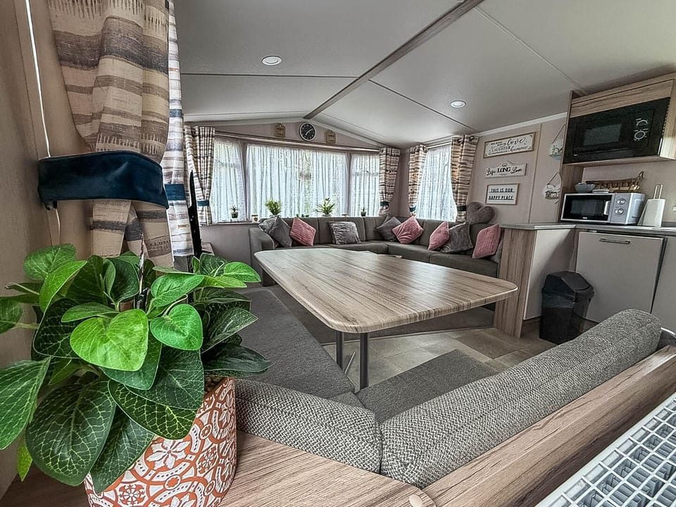 This bright and sociable layout is central to your holiday experience, providing a warm and welcoming hub where your family can gather and enjoy your time together in Essex.