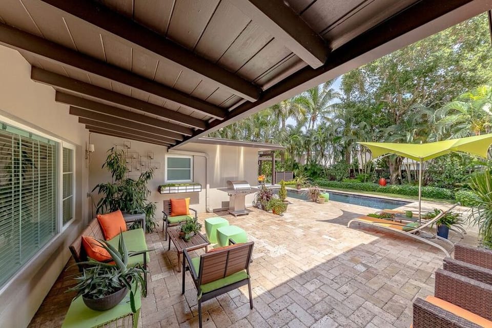 Outdoor living. Step out from the kitchen to covered seating, take in the views.