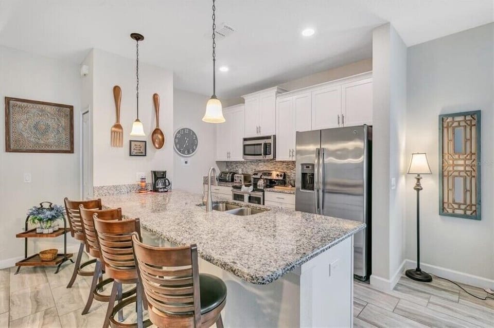 Kitchen with bar stools
