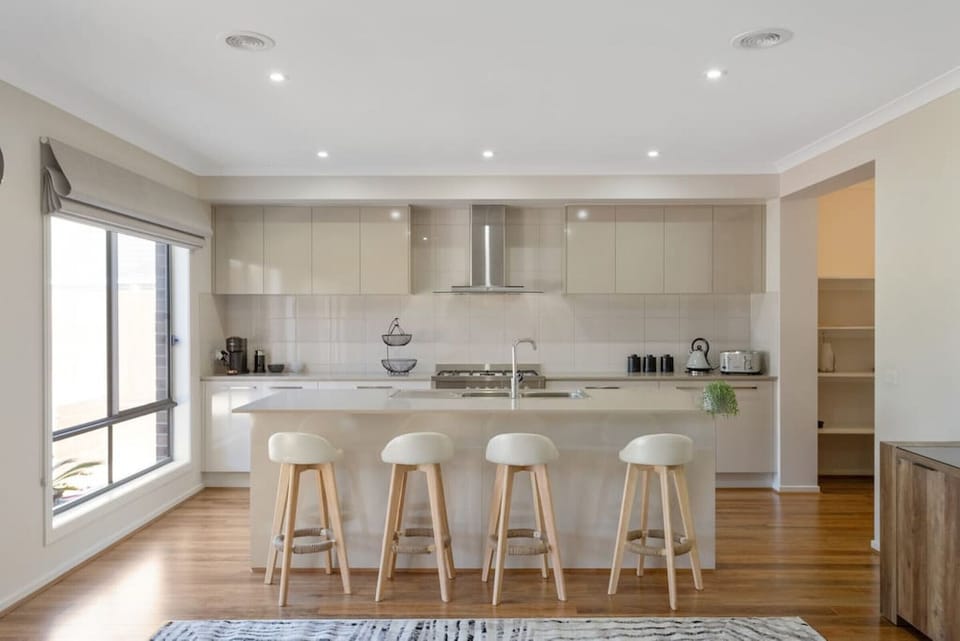 Fully equipped kitchen with the view of back garden