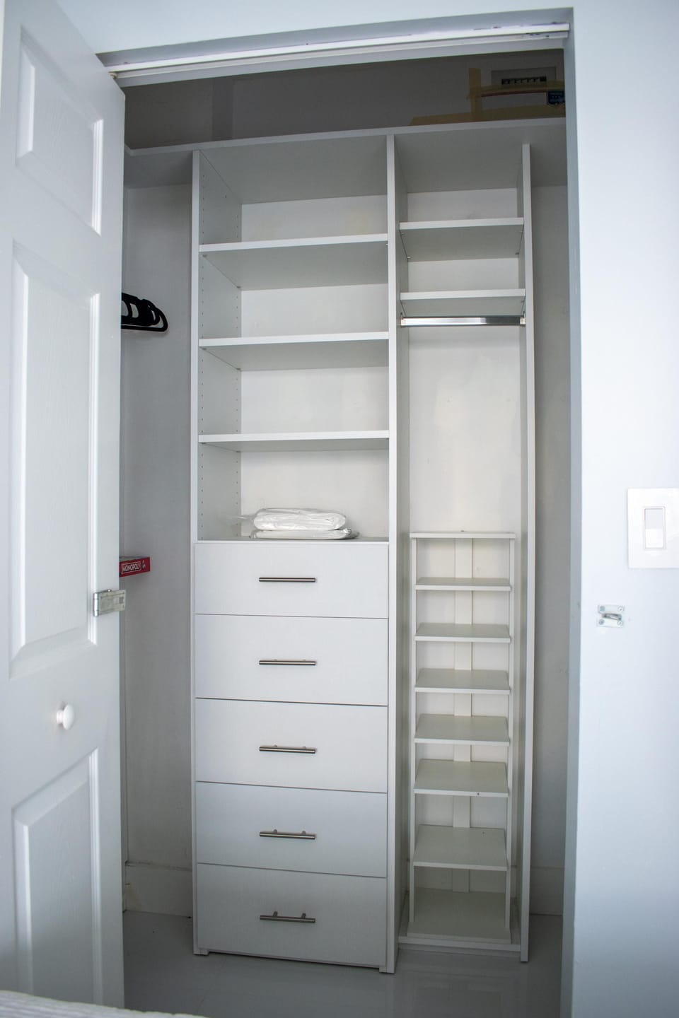 Large closet with plenty of storage to house your best vacation threads.