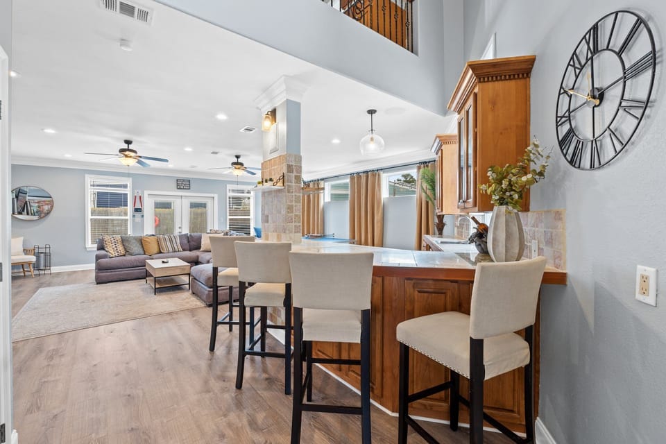 Nice side bar area with 4 comfy bar chairs.