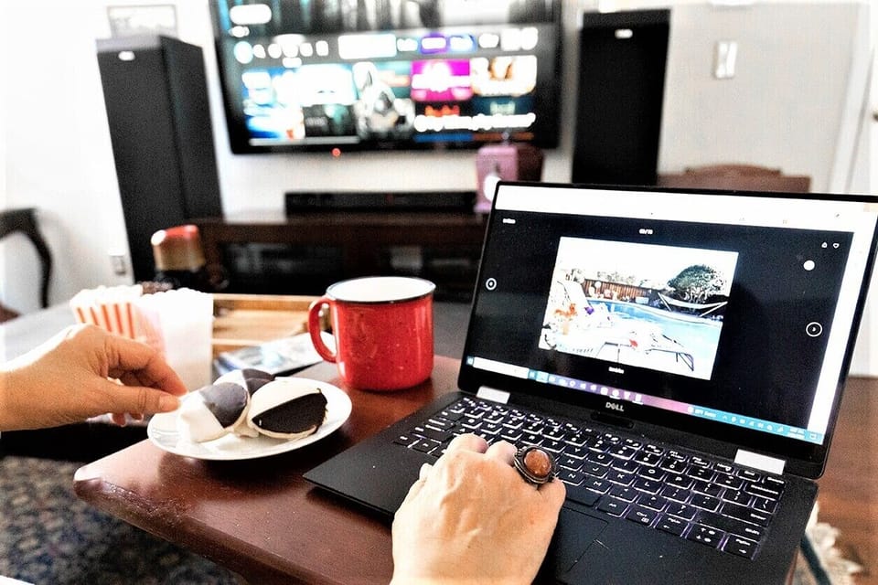 Tray tables provided to enjoy food and computer work while watching TV