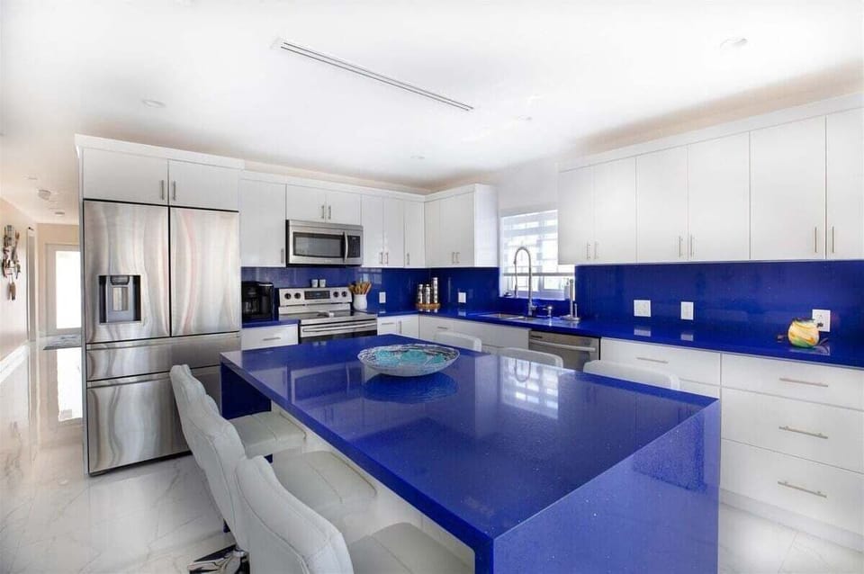 A spacious kitchen designed for preparing fresh catches and vacation feasts alike.