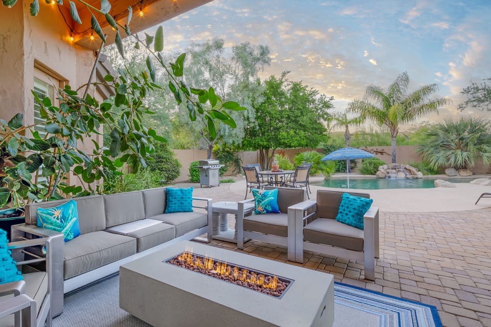 Comfortable outdoor seating area with fire pit. 