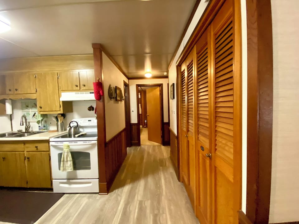 Kitchen and hallway leading to bedrooms