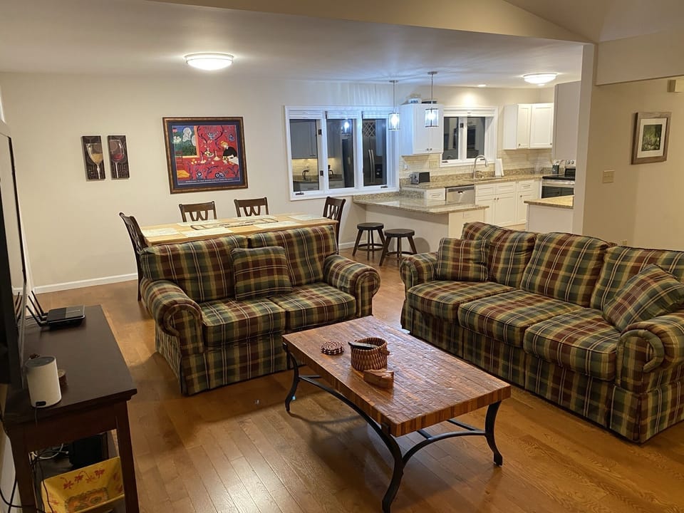 Open floorplan with living, dining and kitchen.