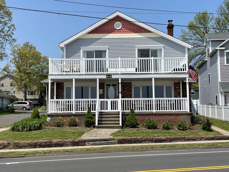 Front of home, choice of two decks to relax on.