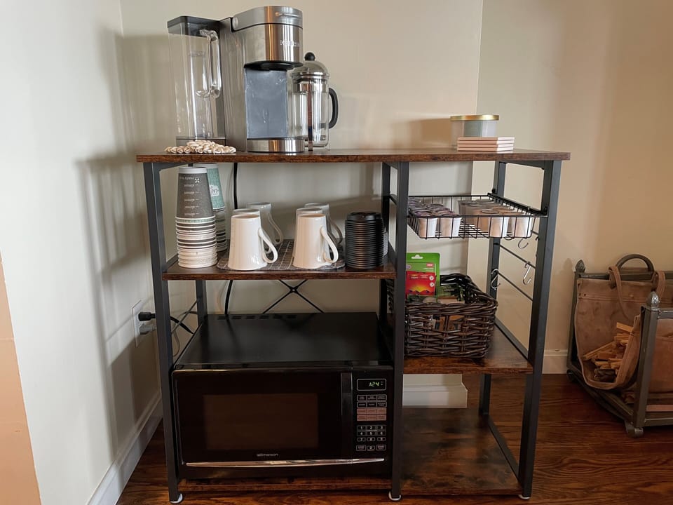 Keurig Machine, French Press, Tea Pot. Complimentary coffee, tea, sugar. 
