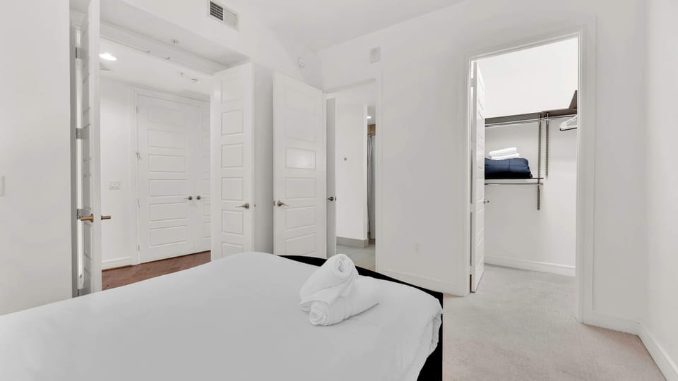 Bedroom: Bright space with modern finishes and easy access to plenty of storage!