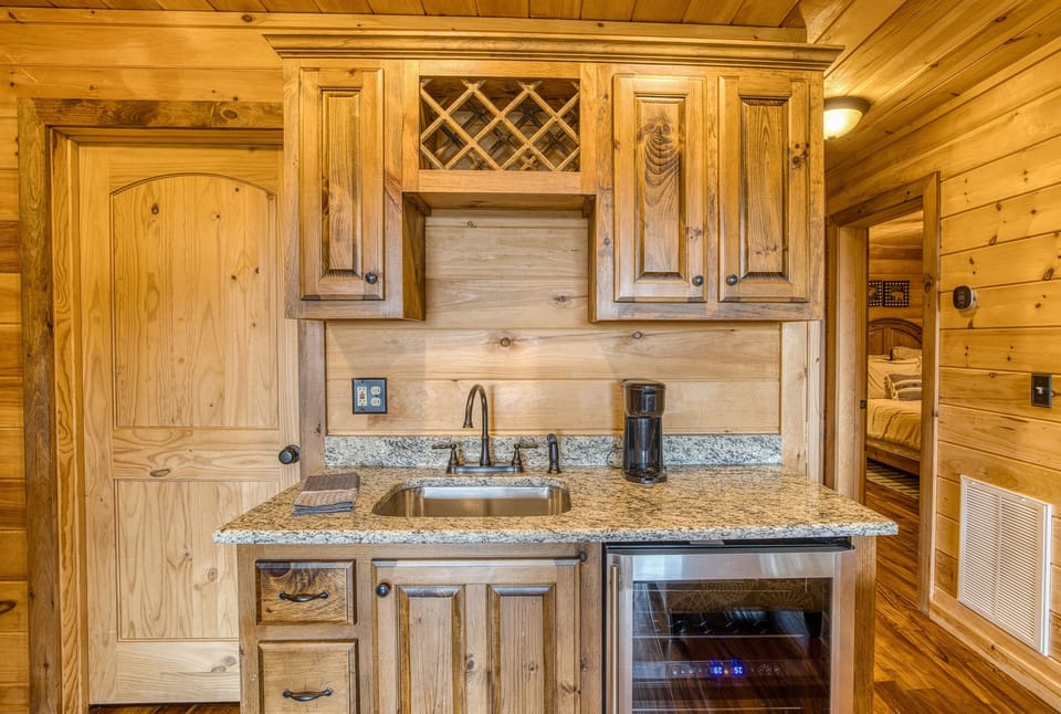 Enjoy chilled beverages from the wet bar fridge or a cup of coffee in the game room