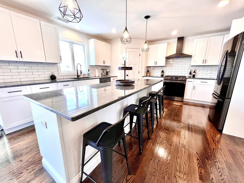 Kitchen: counter seating for 4, gas range and stove with air fryer, microwave