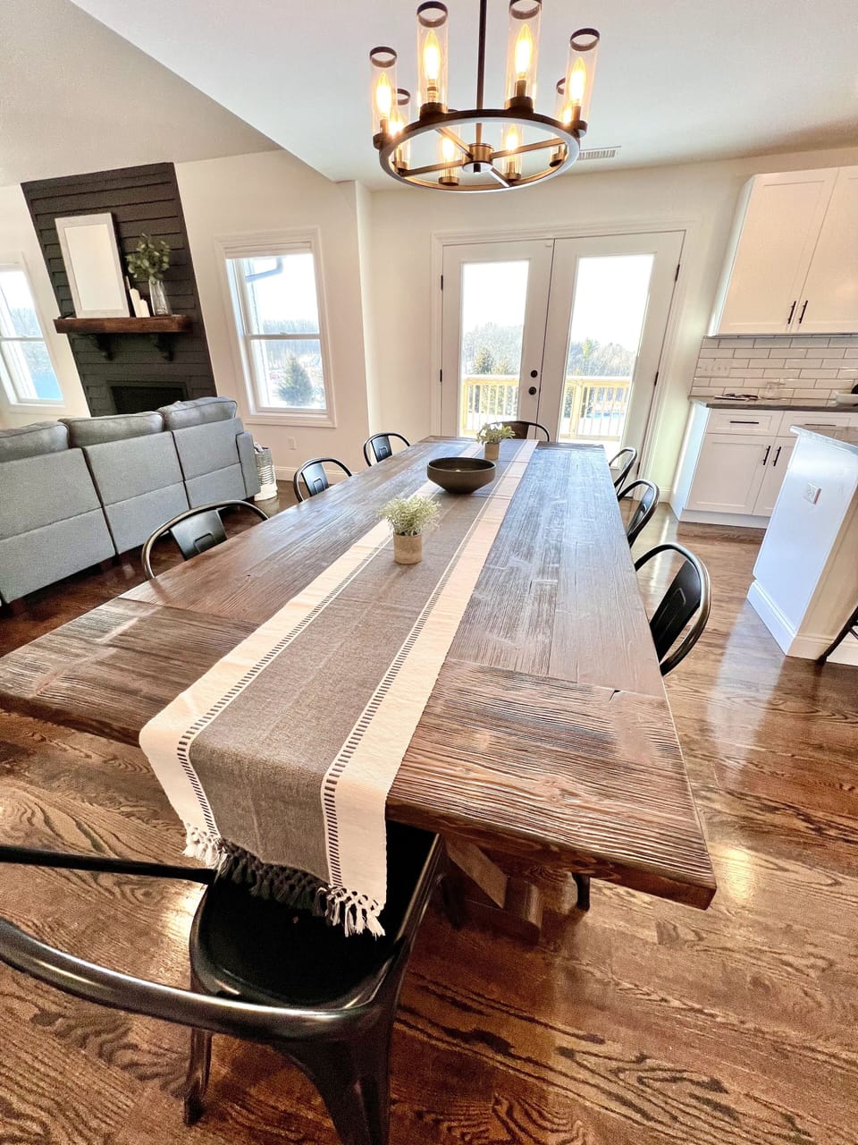 Dining Room: seating for 8 at an expansive reclaimed wood table