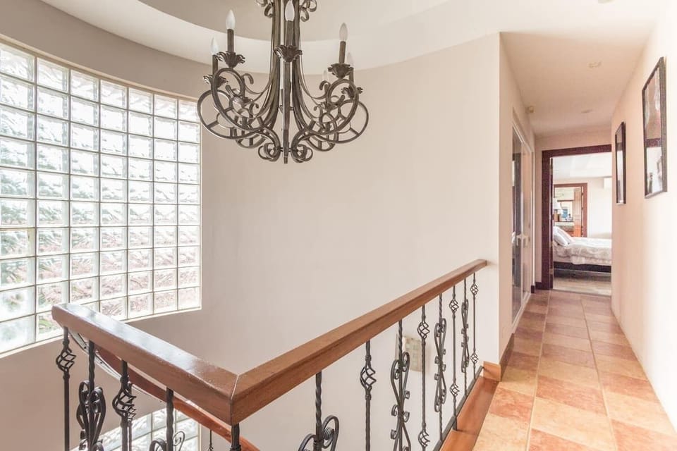 Hallway on second floor of main house.  Room shown in distance is master suite.