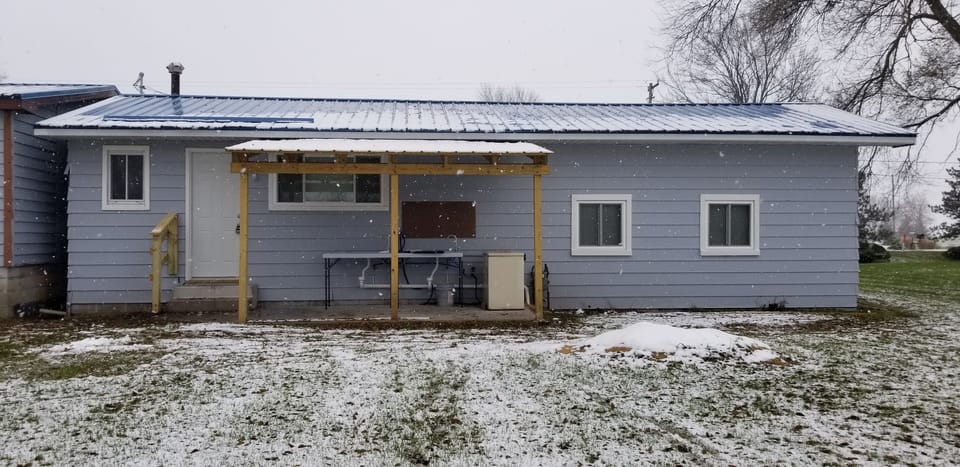 Back view of Cottage A. Double fish cleaning station available for use.