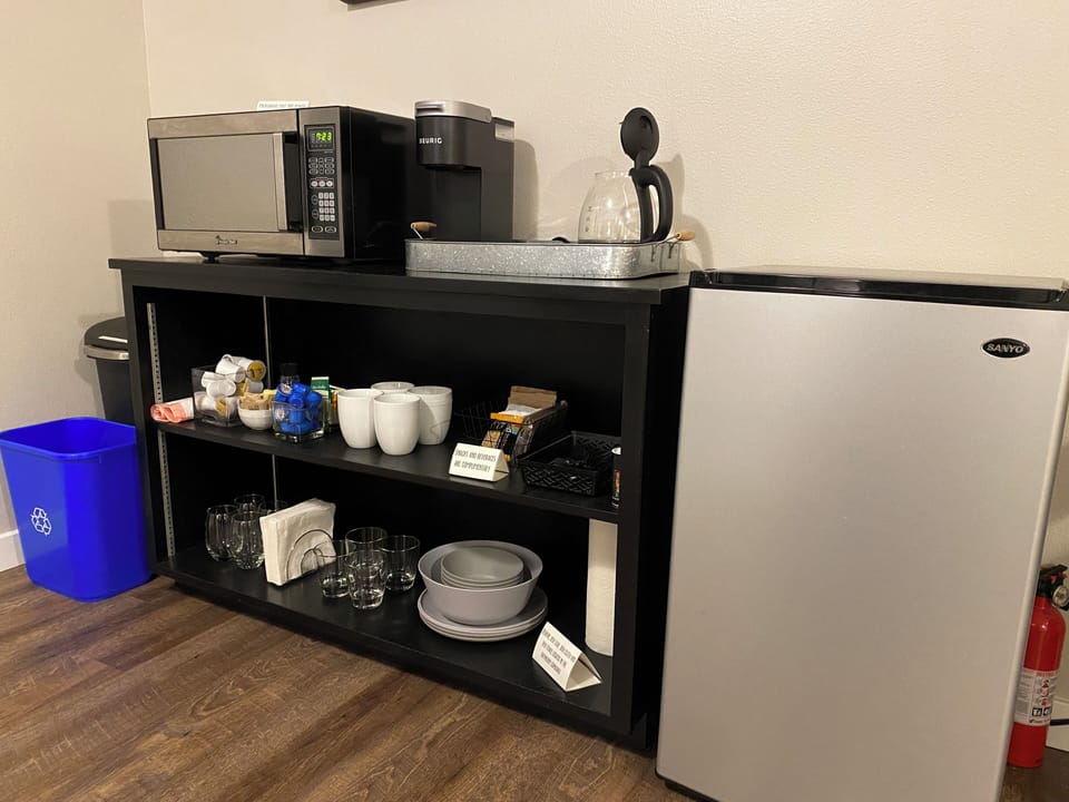 coffee and tea, cups, plates, bowl, utensils, wine glasses and opener, snacks