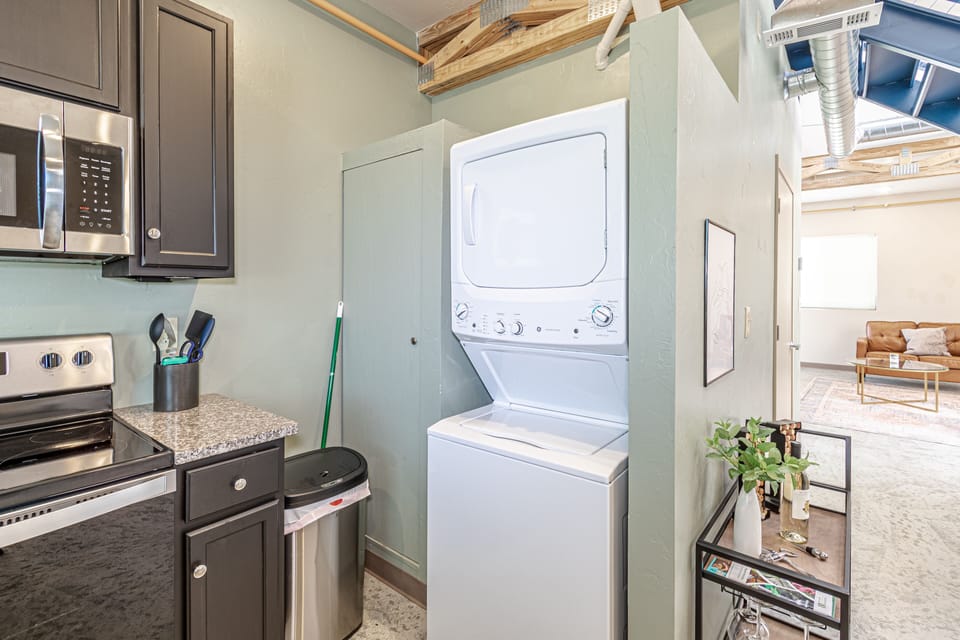 Washer and dryer with detergent pods provided. 