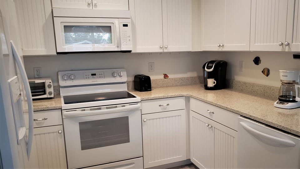 Microwave, toaster oven, toaster, Keurig and regular coffee makers, blender