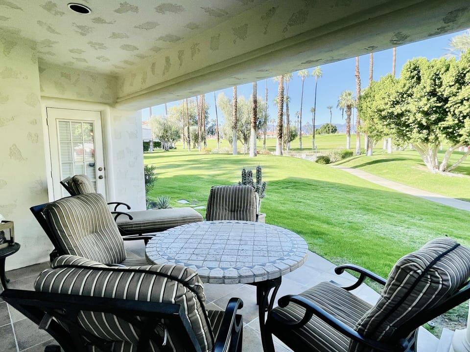 Private patio steps from pool/ hot tub 