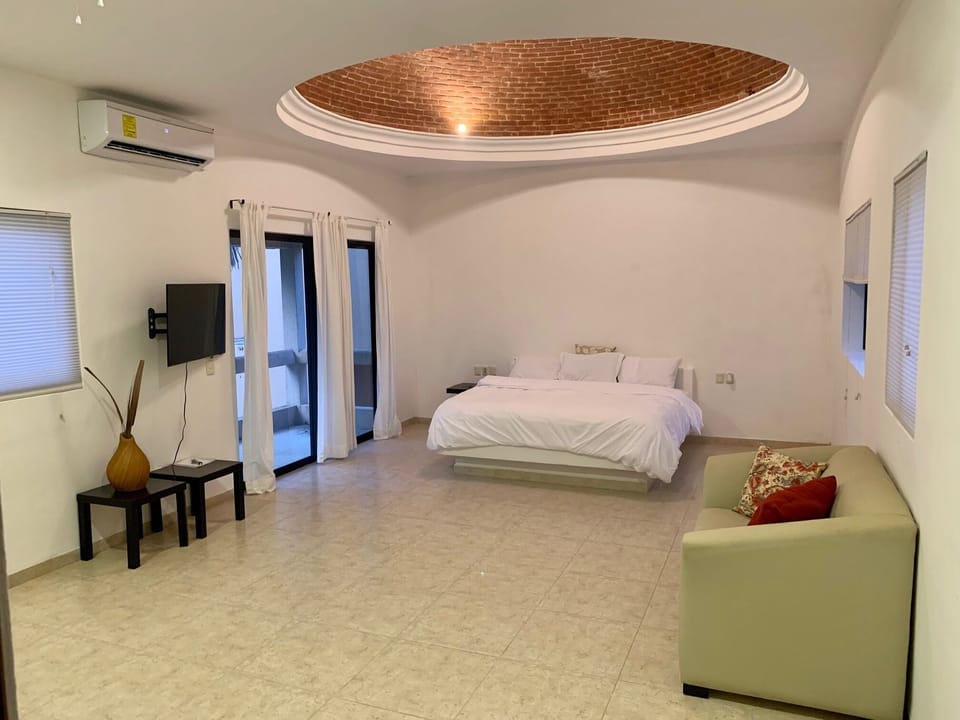 Master Bedroom & Balcony overlooking pool.