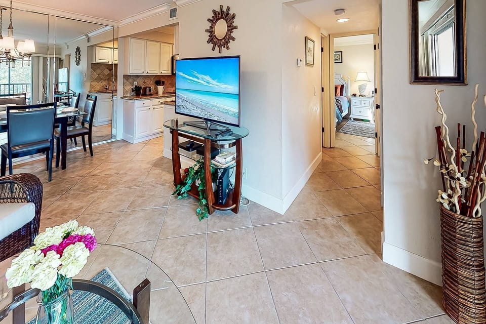 From the living room a is the hallway to bathroom & master bedroom.