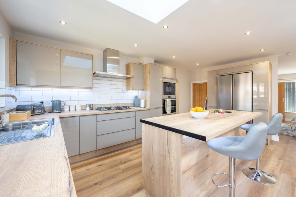 Modern open plan kitchen & dining area with top of the range amenities