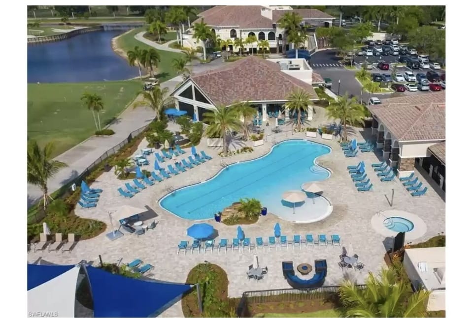 Clubhouse main pool and cabana for casual dining and fitness room