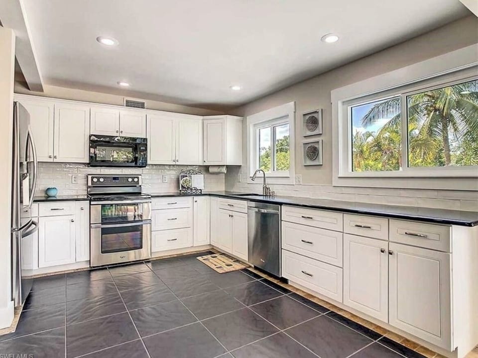 updated kitchen with beautiful views of the backyard